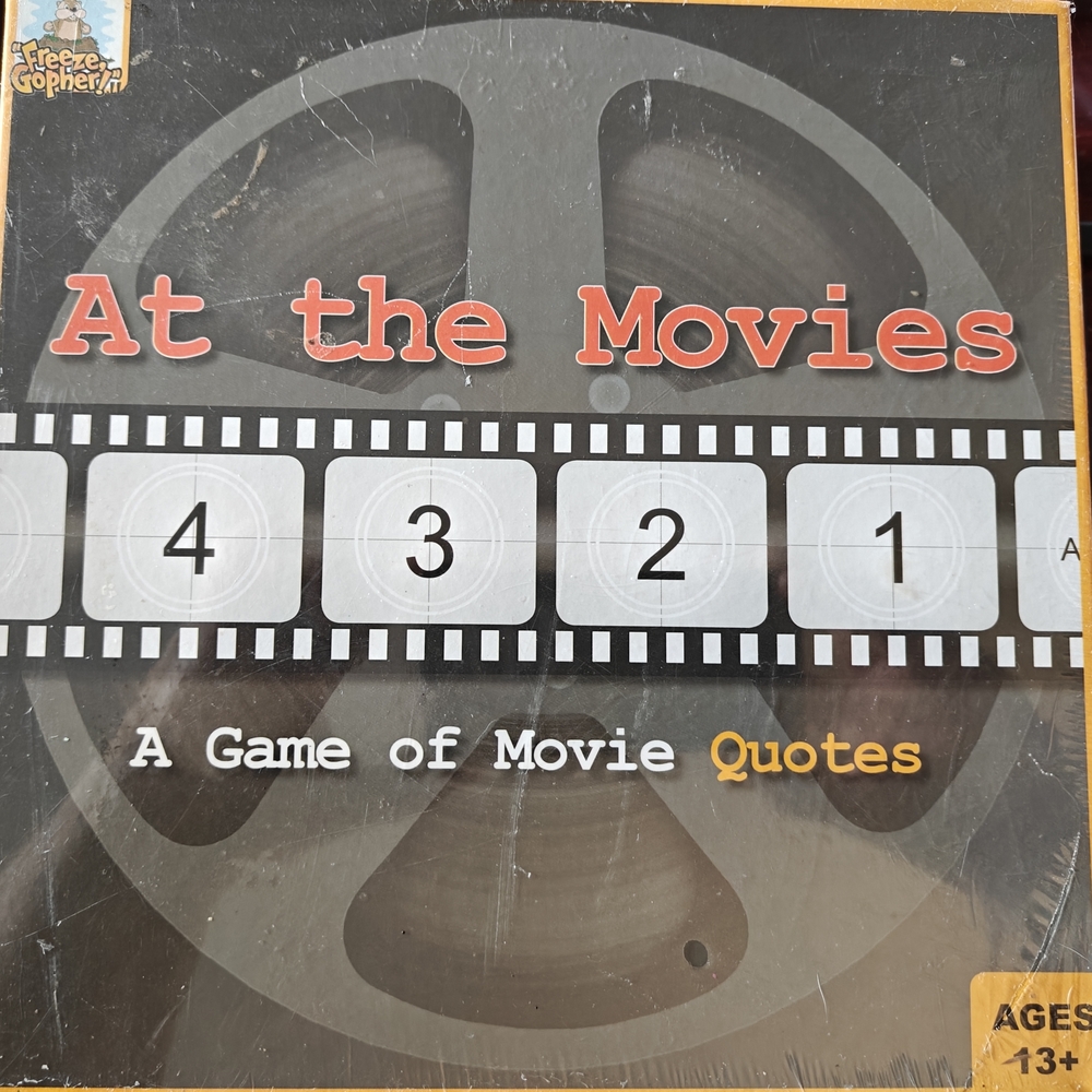 At the Movies: A Game of Movie Quotes (Black)
